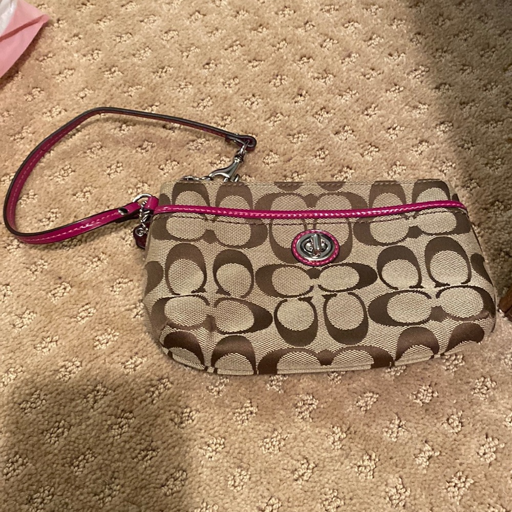 Coach clutch wristlet with pink strap